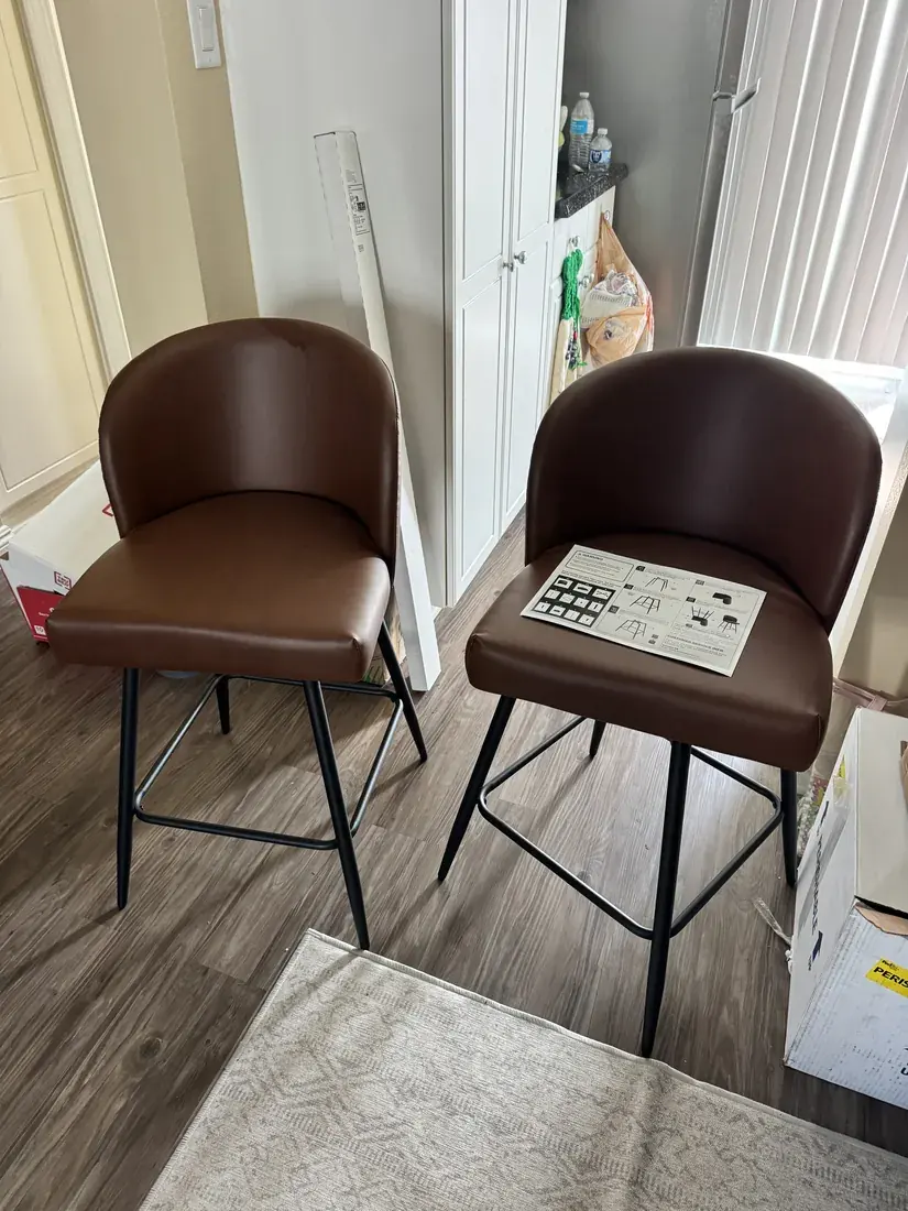 Leather counter stools assembled in Newport Beach, October 2026