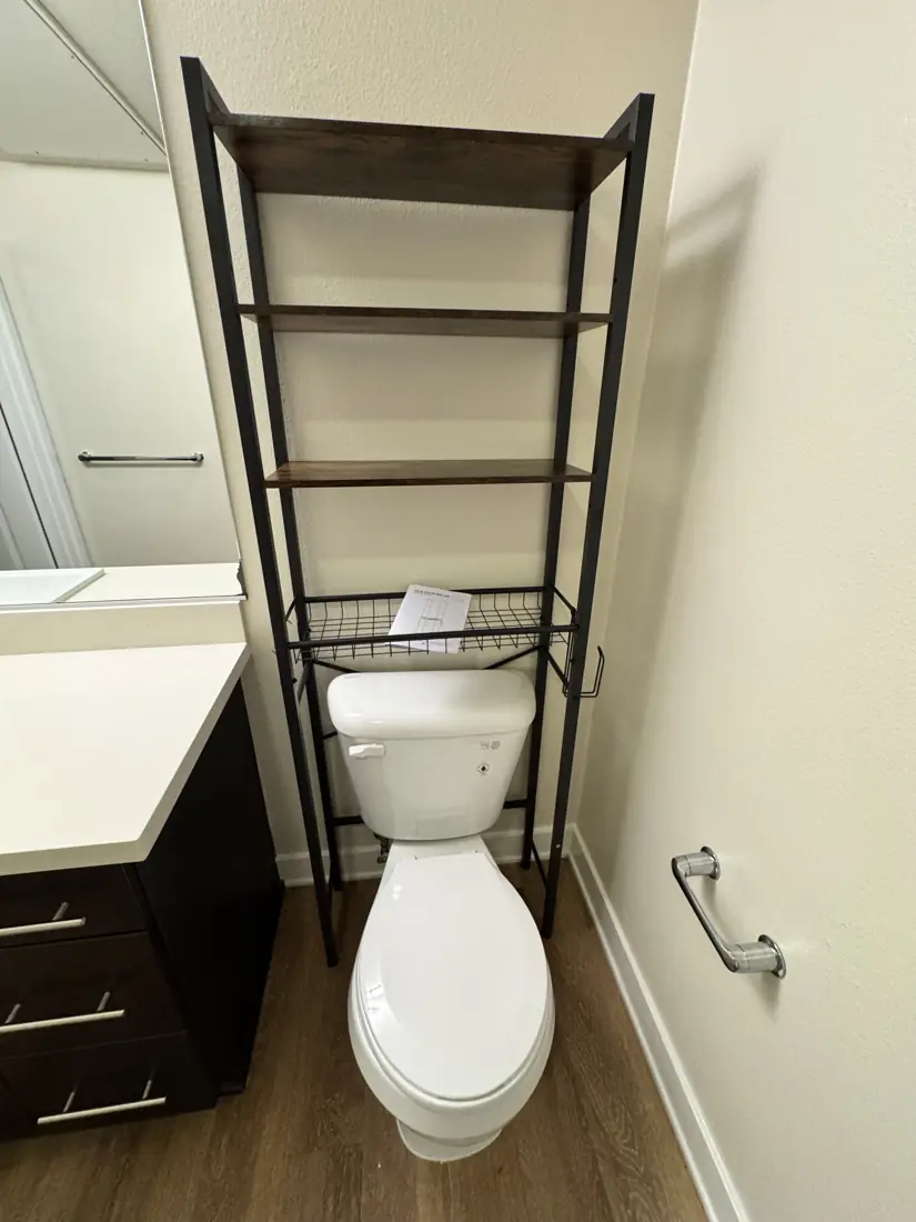Over-the-toilet storage shelf assembled in Orange County
