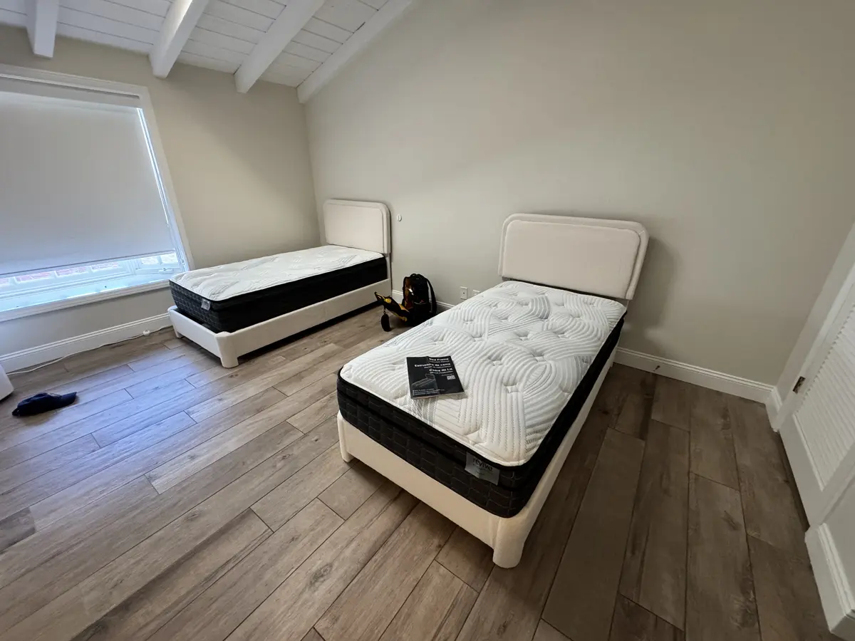 Two upholstered twin bed frames assembled in Orange County