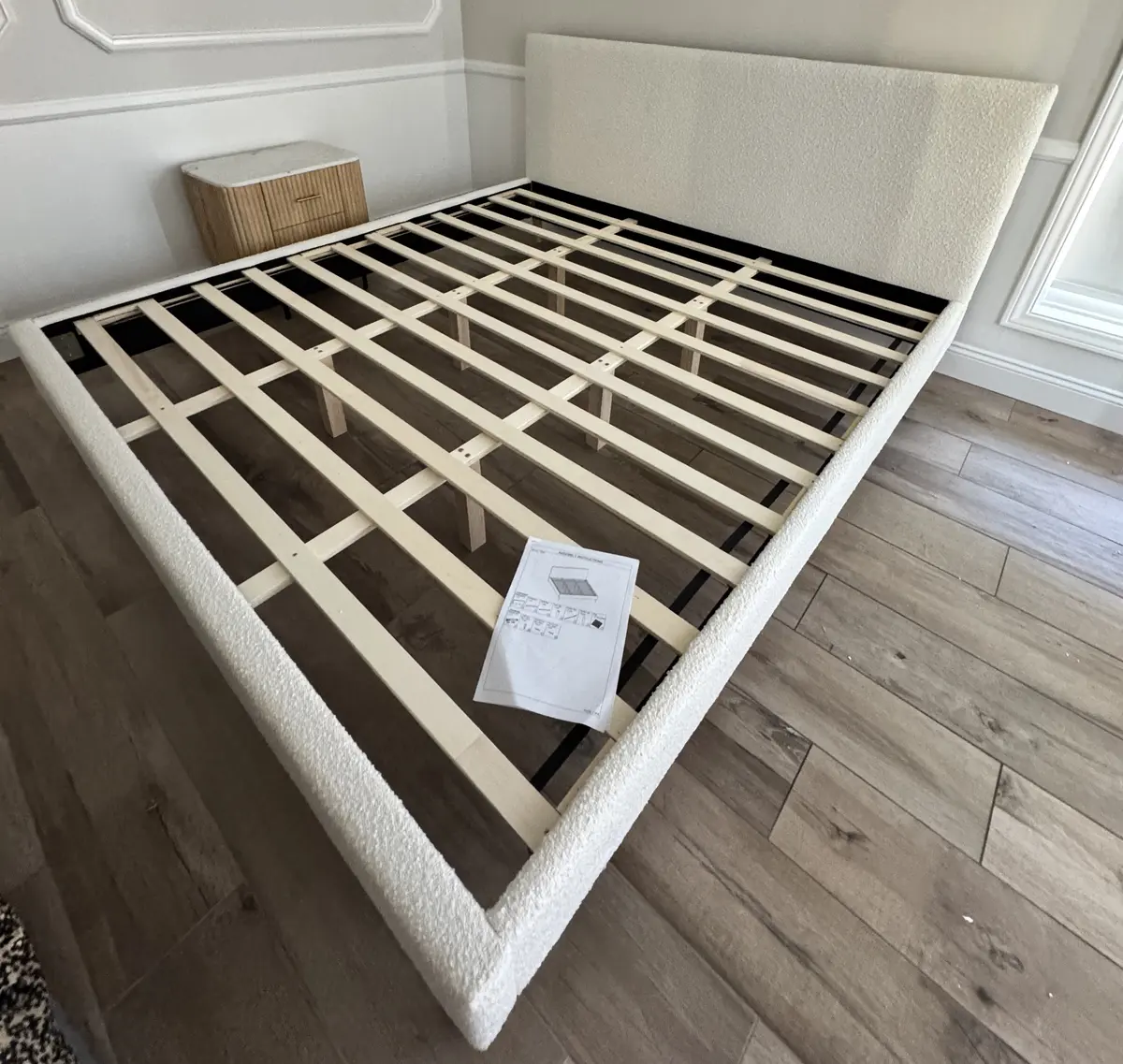 Upholstered bouclé platform bed frame assembled in Orange County