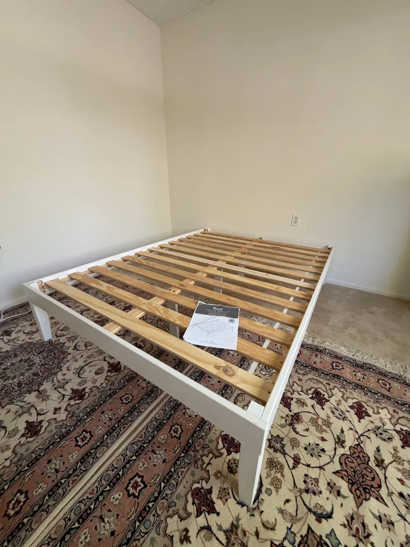 Wood platform bed frame assembled in Laguna Woods, October 2026